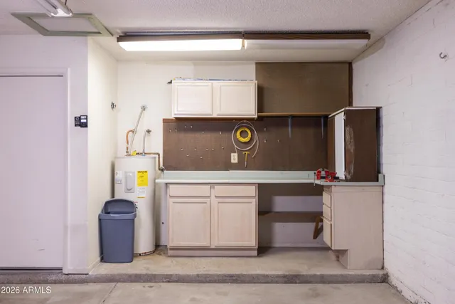 a balcony with table and chairs