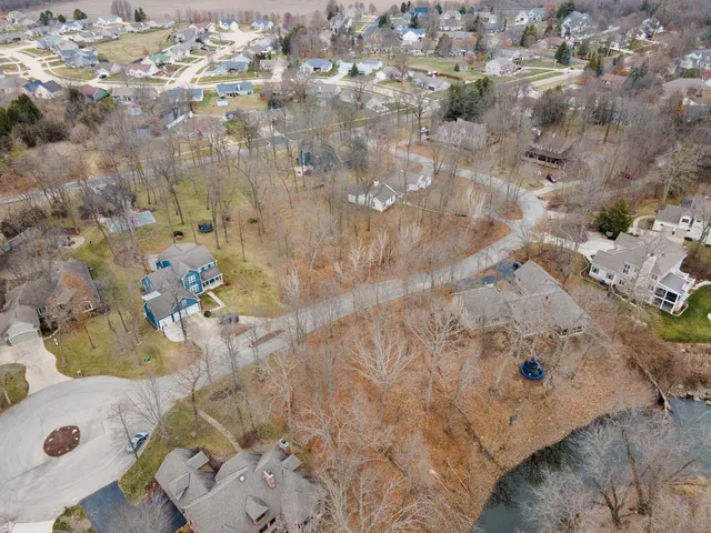 a view of a backyard of the house