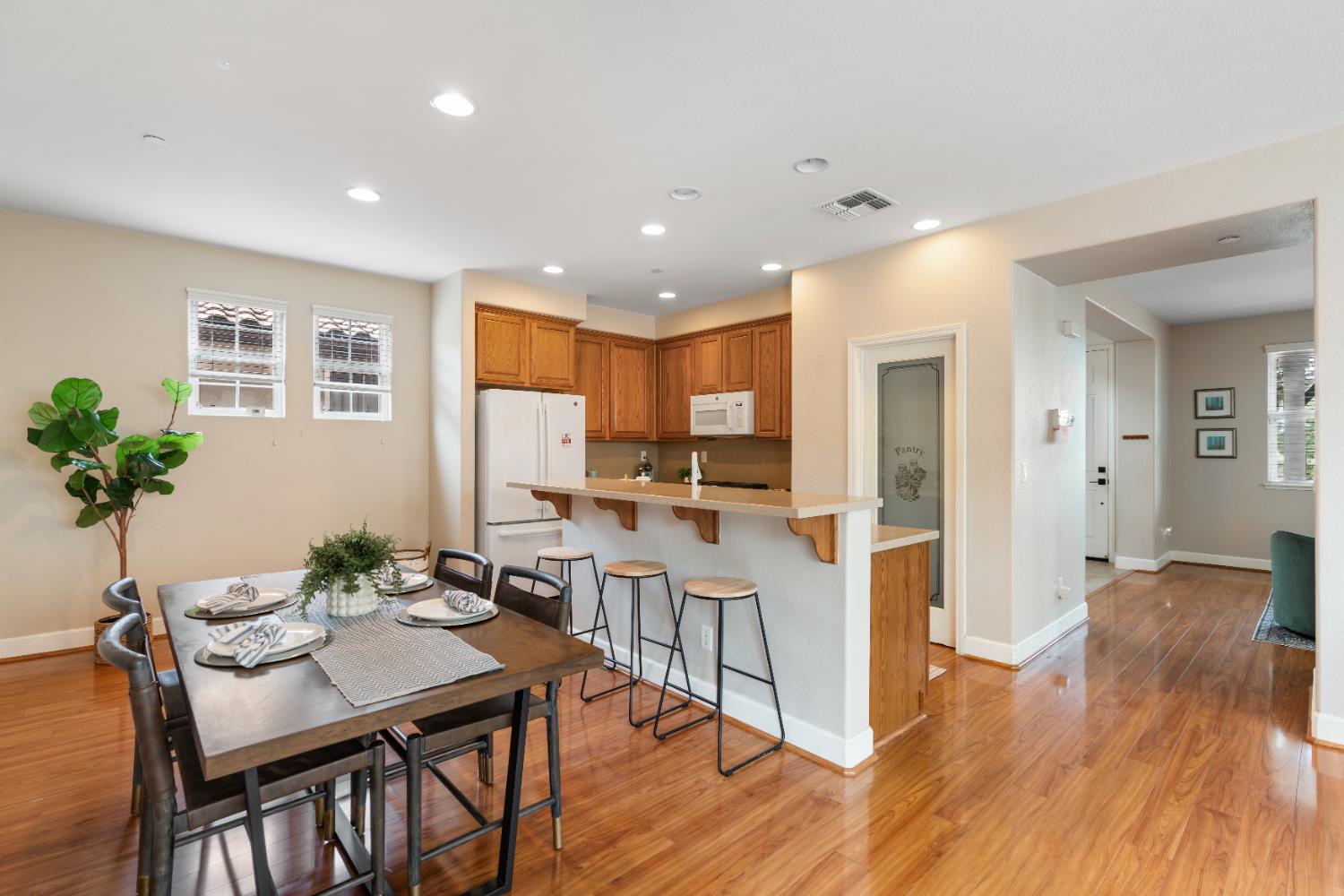 2620 Farmers Central Road Woodland, CA 95776 - Photo 11 of 32 a view of a dining room with furniture window and wooden floor