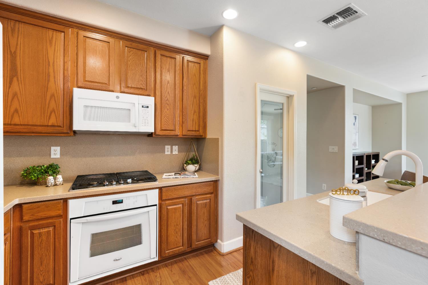 2620 Farmers Central Road Woodland, CA 95776 - Photo 13 of 32 a kitchen with stainless steel appliances granite countertop a sink stove and cabinets