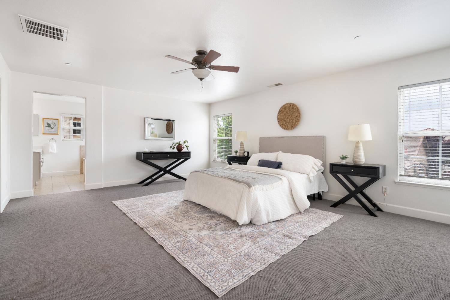 2620 Farmers Central Road Woodland, CA 95776 - Photo 17 of 32 a bedroom with a bed and window
