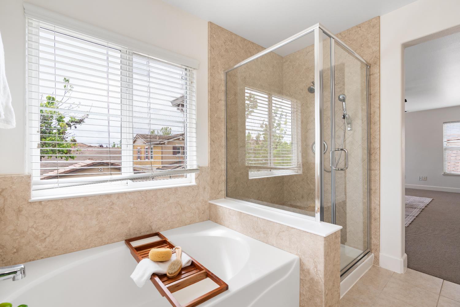 2620 Farmers Central Road Woodland, CA 95776 - Photo 20 of 32 a bathroom with a tub a sink and a window