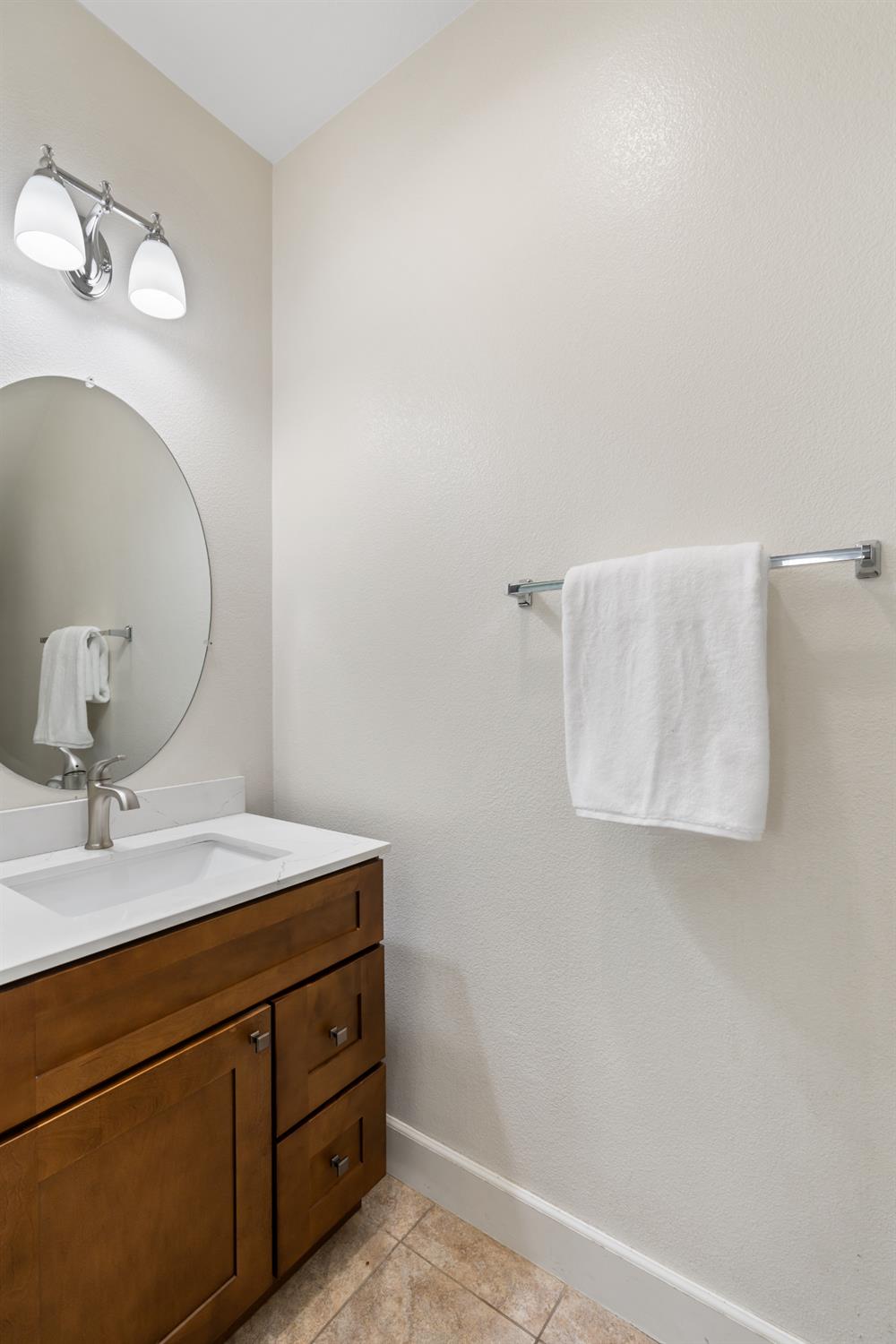 2620 Farmers Central Road Woodland, CA 95776 - Photo 25 of 32 a bathroom with a sink and a mirror