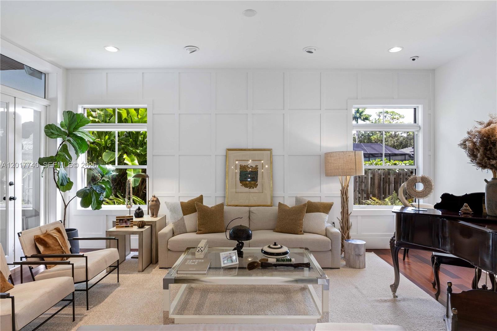 6845 Southwest 98th Street Pinecrest, FL 33156 - Photo 5 of 23 a living room with furniture and a potted plant