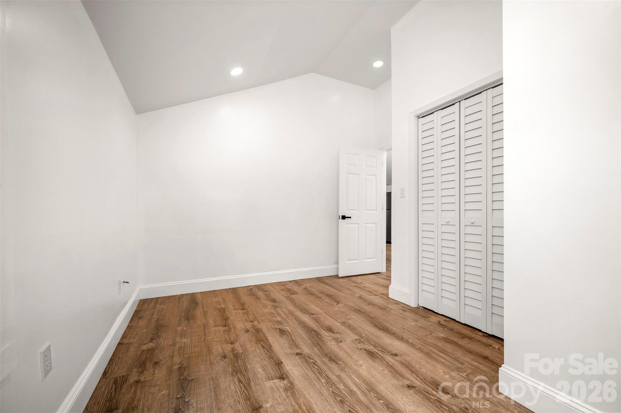 162 Miller Street Spindale, NC 28160 - Photo 14 of 27 a view of a room with wooden floor and white walls