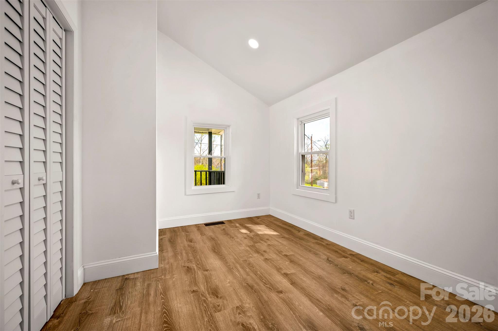 162 Miller Street Spindale, NC 28160 - Photo 15 of 27 an empty room with windows