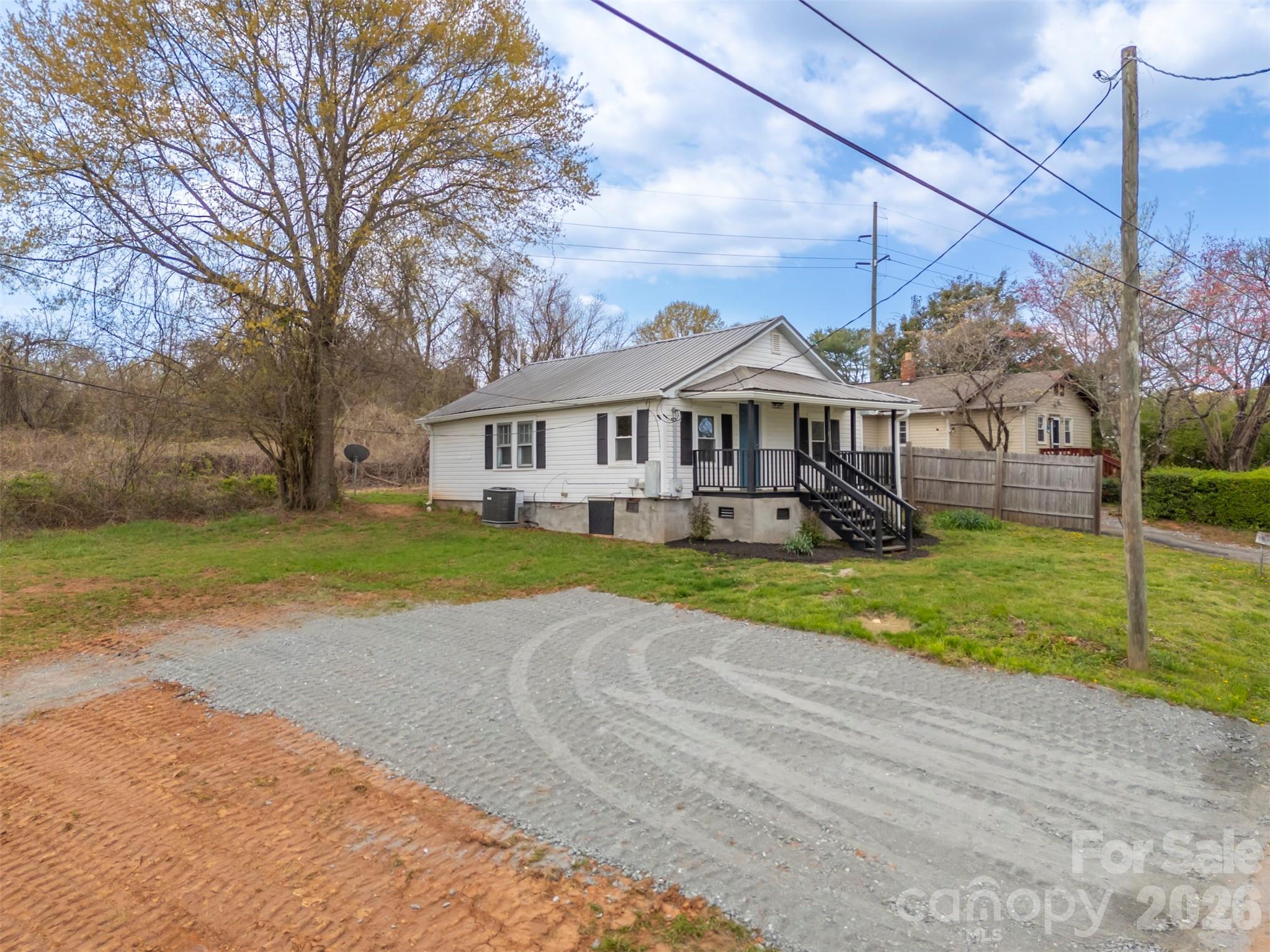 162 Miller Street Spindale, NC 28160 - Photo 21 of 27 a view of house with a yard