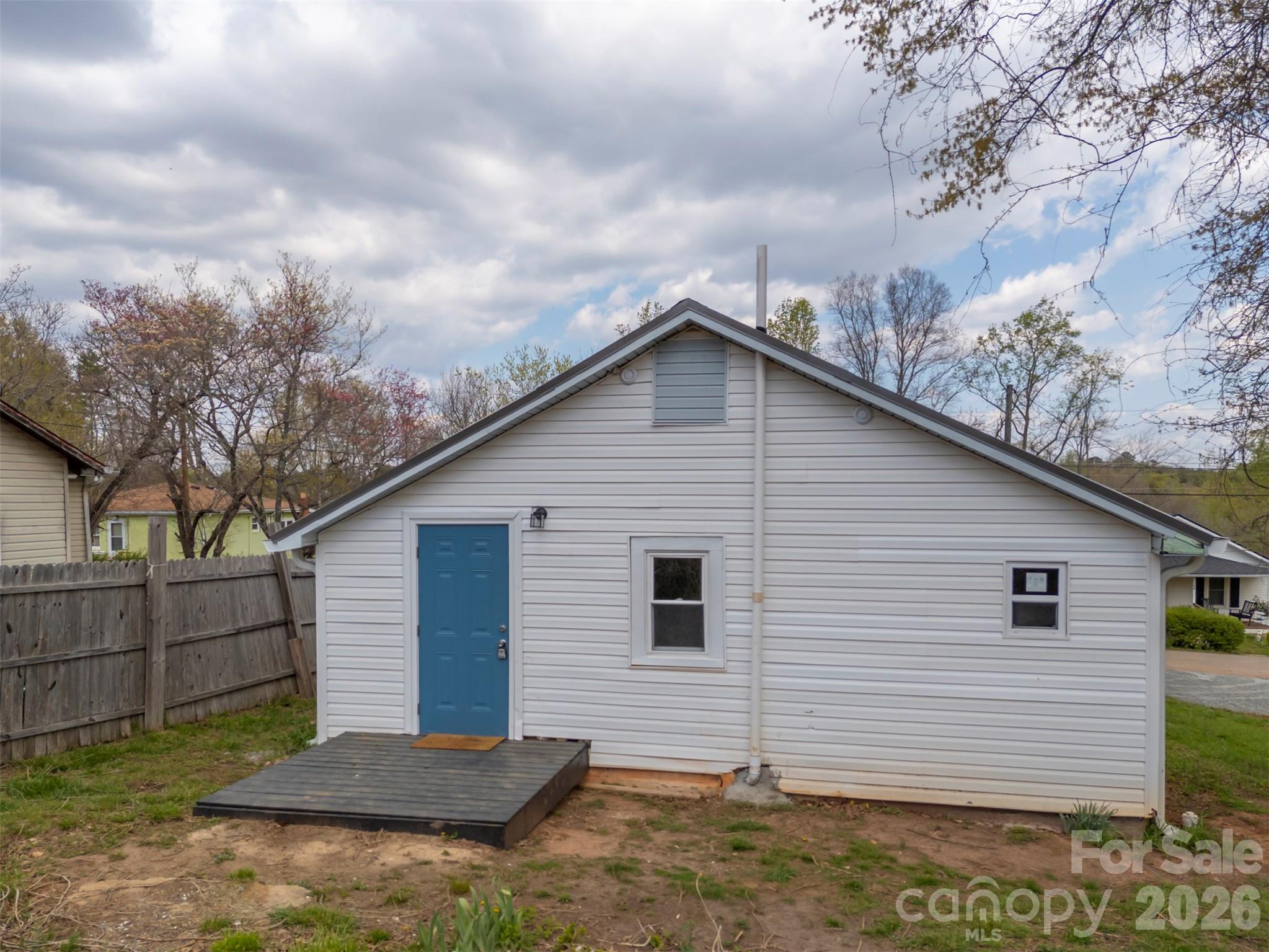 162 Miller Street Spindale, NC 28160 - Photo 24 of 27 a view of a house with a yard