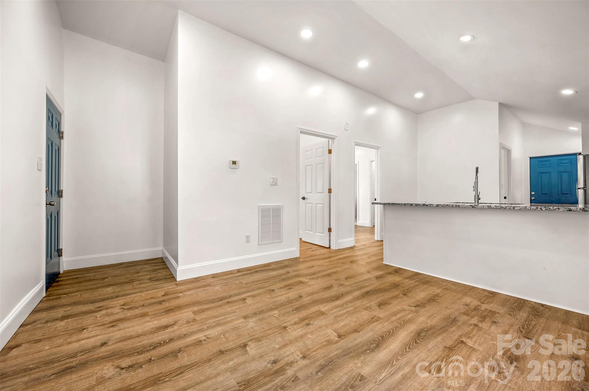 162 Miller Street Spindale, NC 28160 - Photo 4 of 27 a view of an empty room with wooden floor