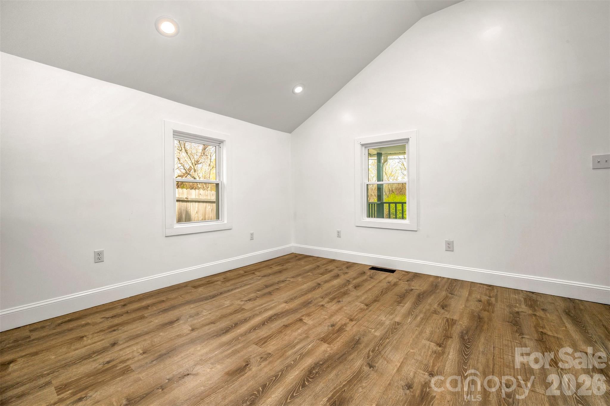 162 Miller Street Spindale, NC 28160 - Photo 10 of 27 a view of empty room with wooden floor and fan