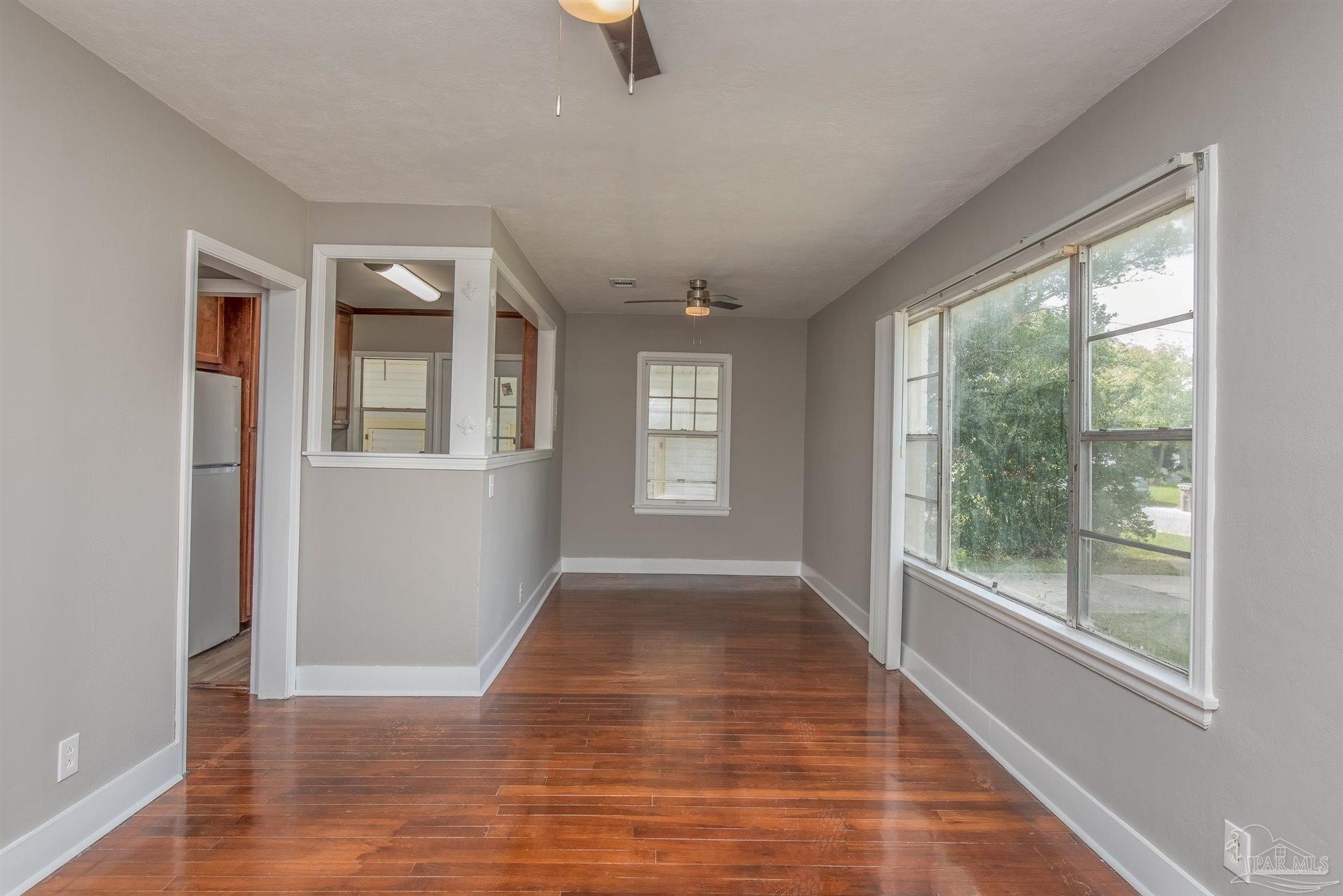 225 Bryant Road Pensacola, FL 32507 - Photo 4 of 21 a view of an empty room with glass door and balcony