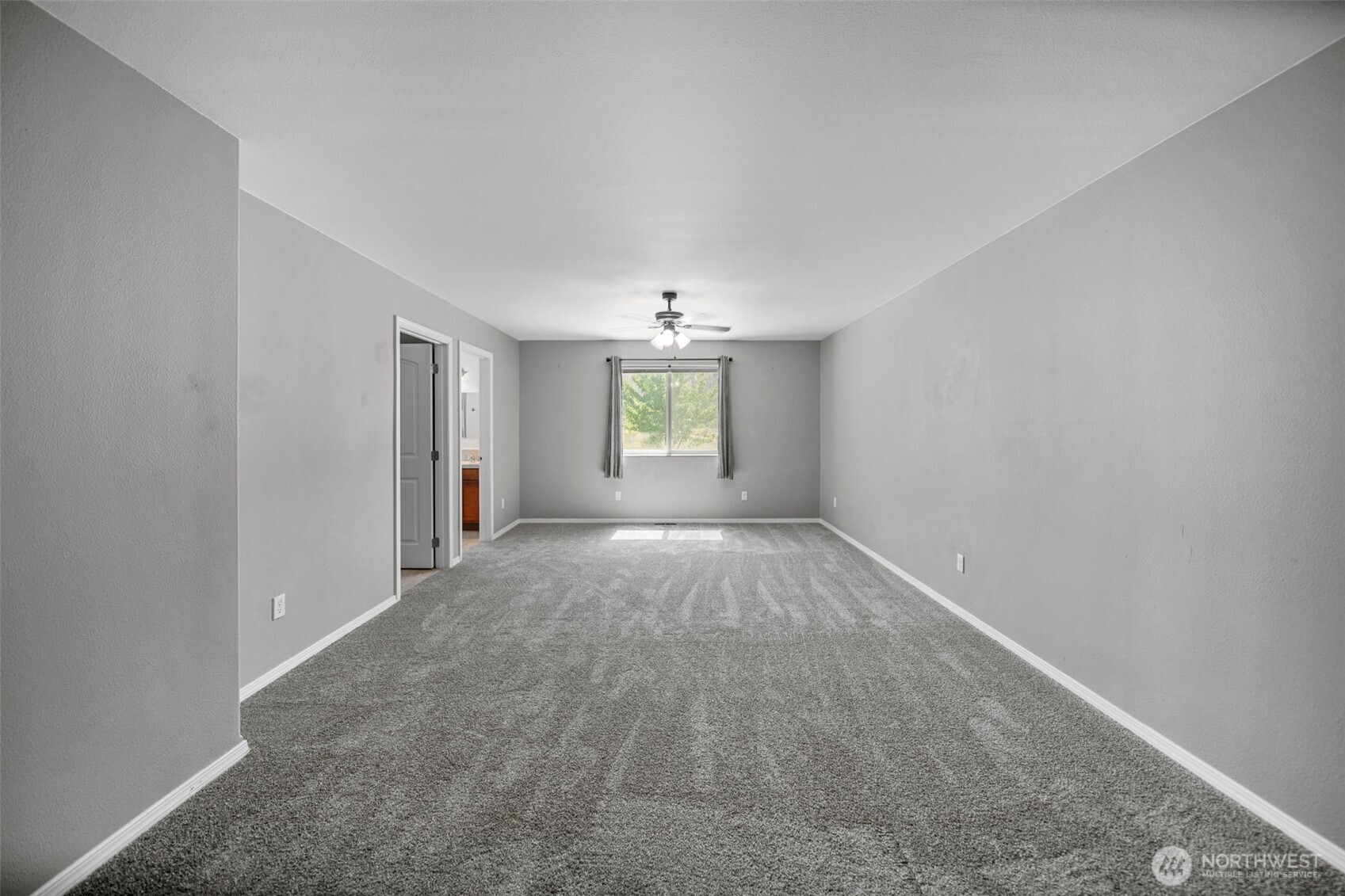 6132 Entiat River Road Entiat, WA 98822 - Photo 20 of 40 wooden floor in an empty room with a window