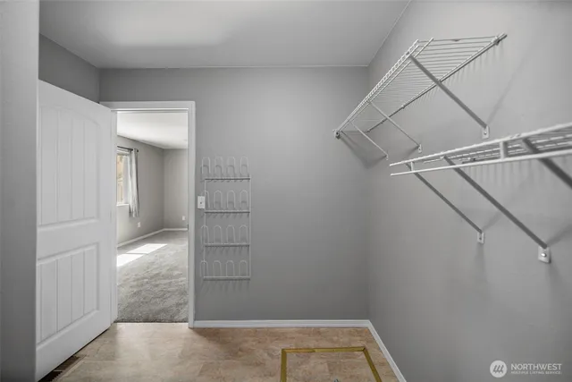 a view of a room with racks on the wall