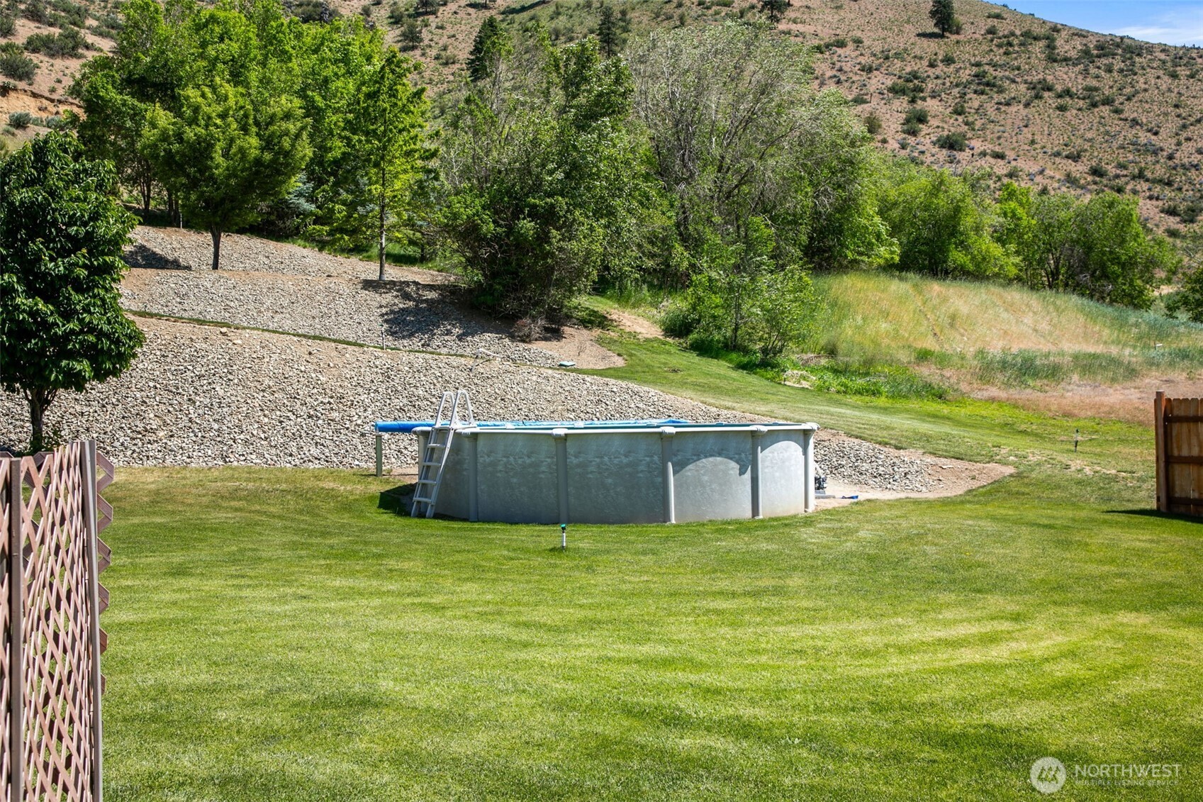 6132 Entiat River Road Entiat, WA 98822 - Photo 37 of 40 a view of a pool with a yard