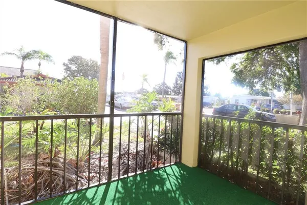 a view of a balcony with lake view