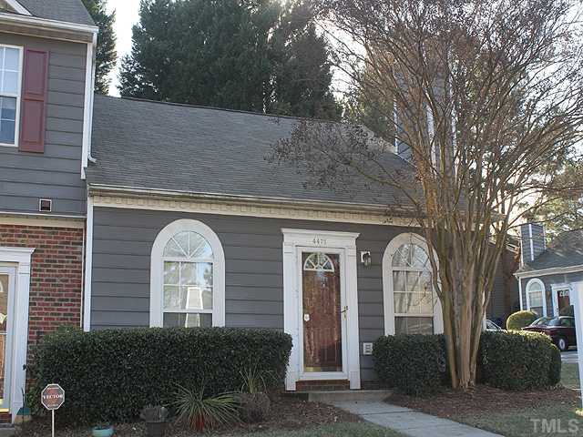 4475 Still Pines Drive Raleigh, NC 27613 - Photo 1 of 12 a front view of a house with garden