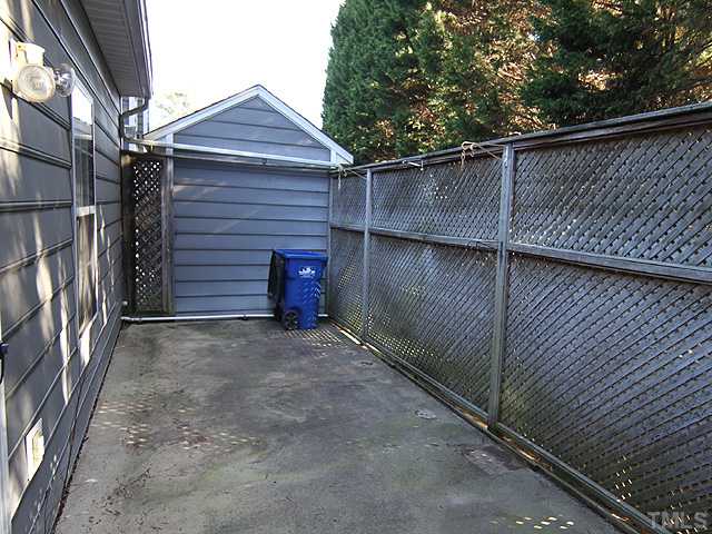 4475 Still Pines Drive Raleigh, NC 27613 - Photo 11 of 12 a backyard of a house