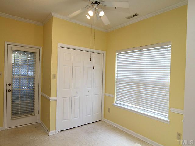 4475 Still Pines Drive Raleigh, NC 27613 - Photo 6 of 12 a view of a livingroom with a chandelier