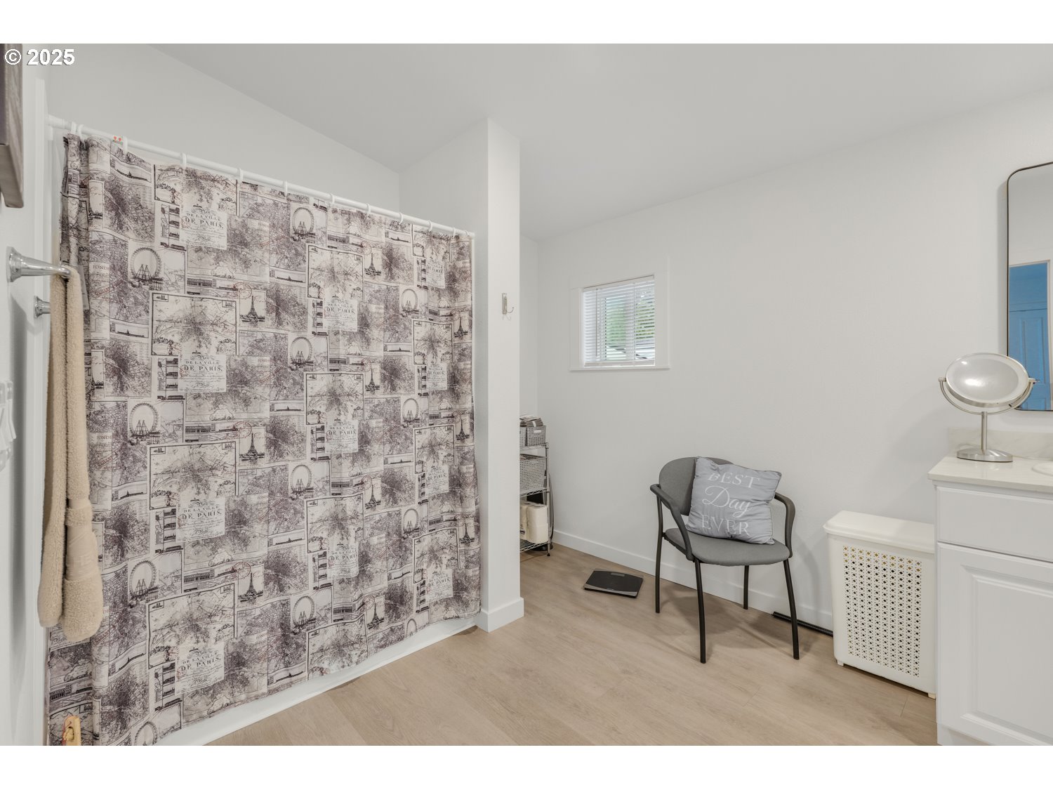 18780 South Central Point Road, Unit 19 Oregon City, OR 97045 - Photo 21 of 25 a room with a chair and a lamp on table