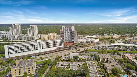 an aerial view of residential building and parking space