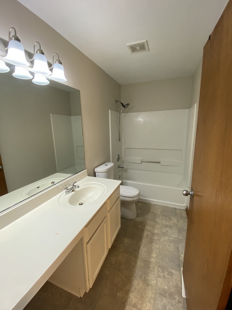 610 Springbrook Trail North, Unit 610 Oswego, IL 60543 - Photo 8 of 11