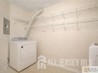 31 Edinburgh Court Edison, NJ 08820 - Photo 18 of 25 a view of utility room