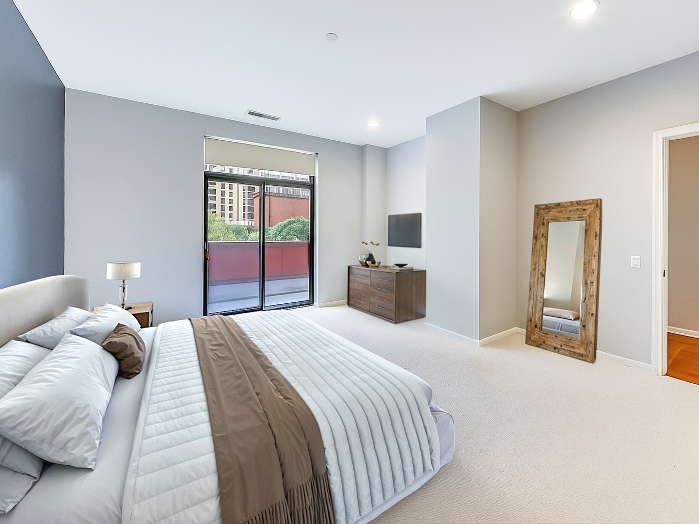 33 West Huron Street, Unit 412 Chicago, IL 60654 - Photo 19 of 33 a bedroom with a bed and a large window