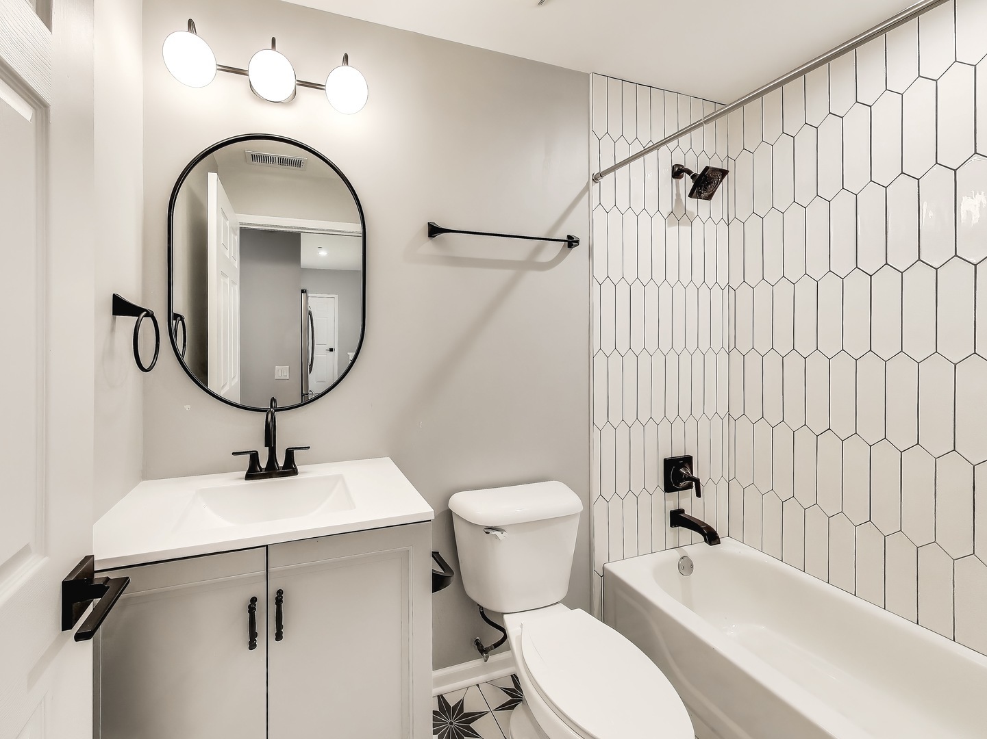 33 West Huron Street, Unit 412 Chicago, IL 60654 - Photo 28 of 33 a bathroom with a sink toilet and a mirror