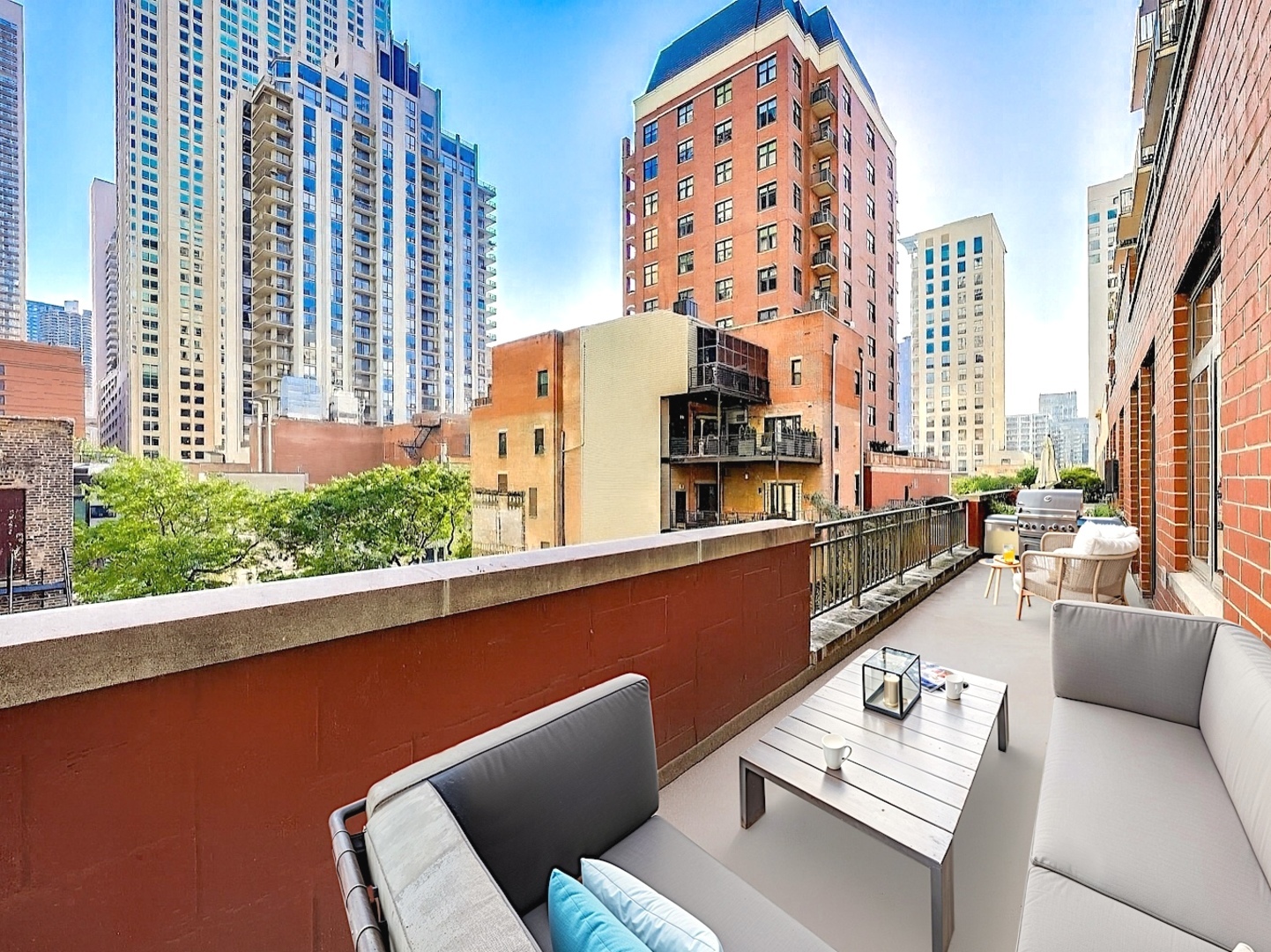 33 West Huron Street, Unit 412 Chicago, IL 60654 - Photo 30 of 33 a living room with furniture and a large window