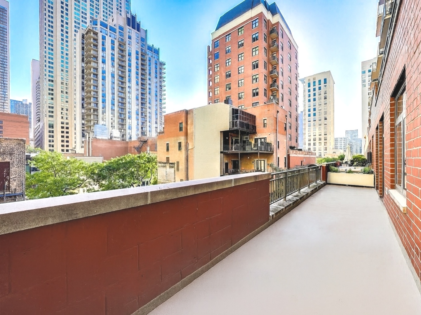 33 West Huron Street, Unit 412 Chicago, IL 60654 - Photo 31 of 33 a view of a city from a balcony