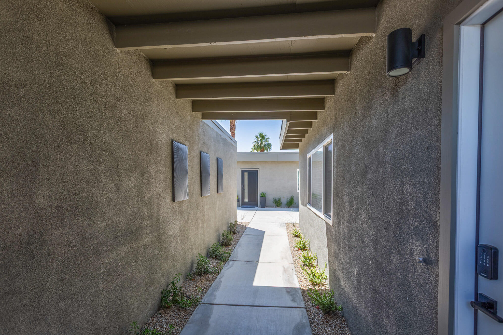 41615 Morningside Court, Unit A Rancho Mirage, CA 92270 - Photo 4 of 20 a view of a door of the house