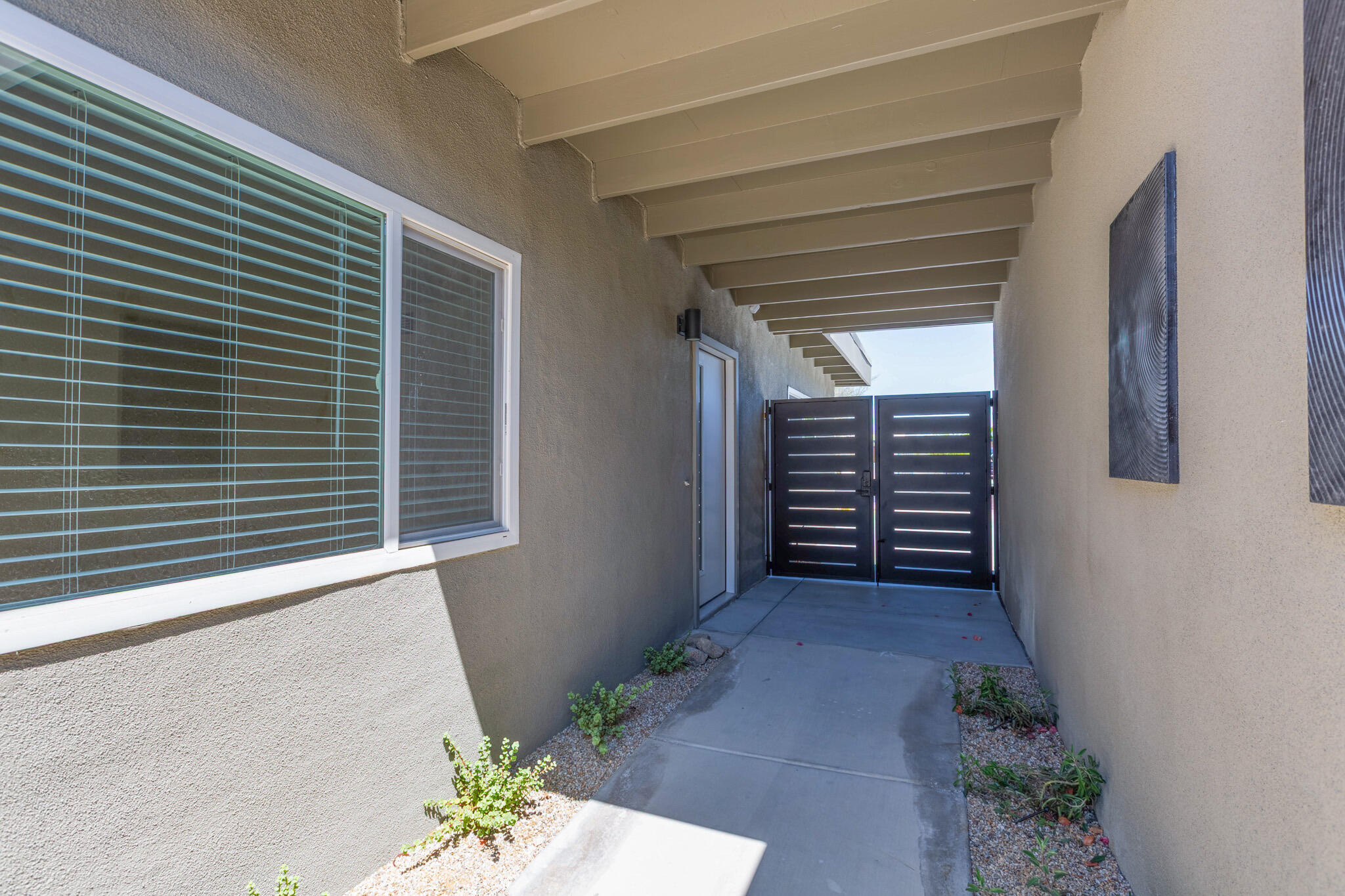 41615 Morningside Court, Unit A Rancho Mirage, CA 92270 - Photo 5 of 20 a view of a house with a small yard