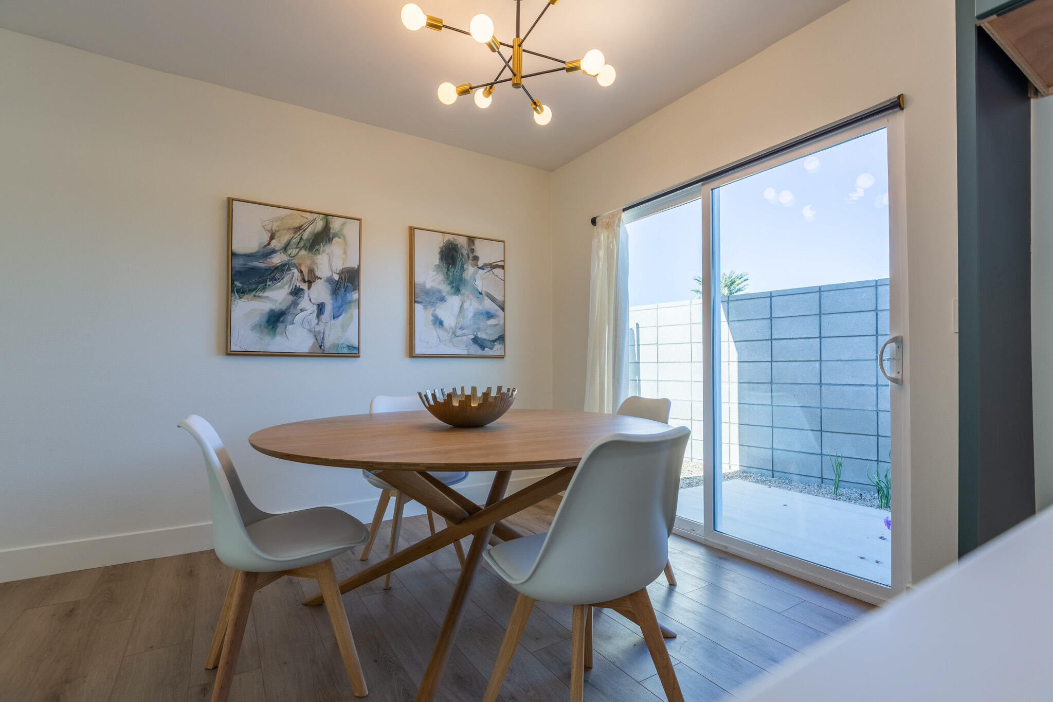41615 Morningside Court, Unit A Rancho Mirage, CA 92270 - Photo 9 of 20 a view of a dining room with furniture window and wooden floor