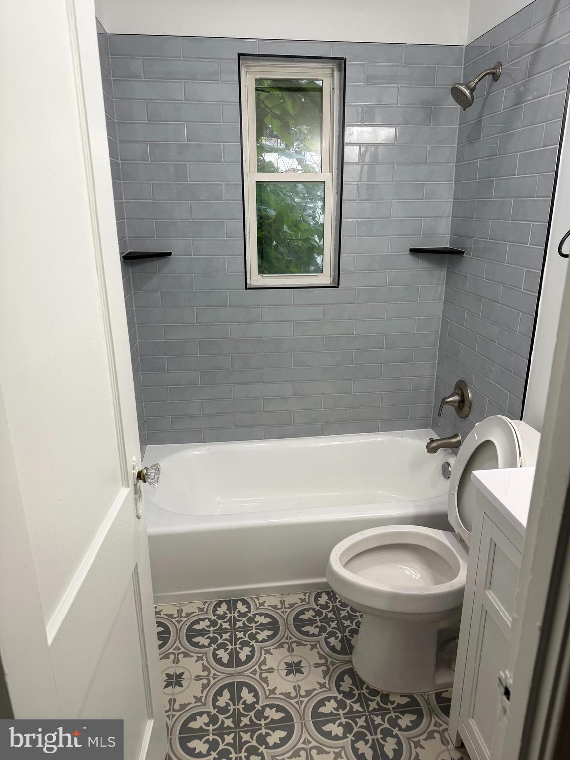 110 P Street Southwest, Unit 2 Washington, DC 20024 - Photo 5 of 7 a bathroom with a toilet and a shower