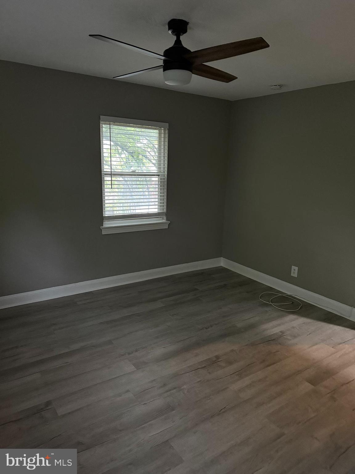 110 P Street Southwest, Unit 2 Washington, DC 20024 - Photo 6 of 7 wooden floor in an empty room with a window