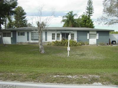 18612 Geranium Road Fort Myers, FL 33967 - Photo 1 of 9 a front view of house with yard and trees