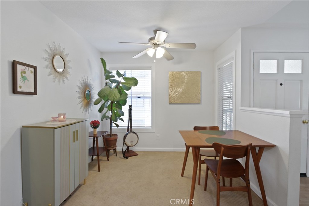 112 Timbre Rancho Santa Margarita, CA 92688 - Photo 4 of 11 a view of a dining room with furniture and chandelier