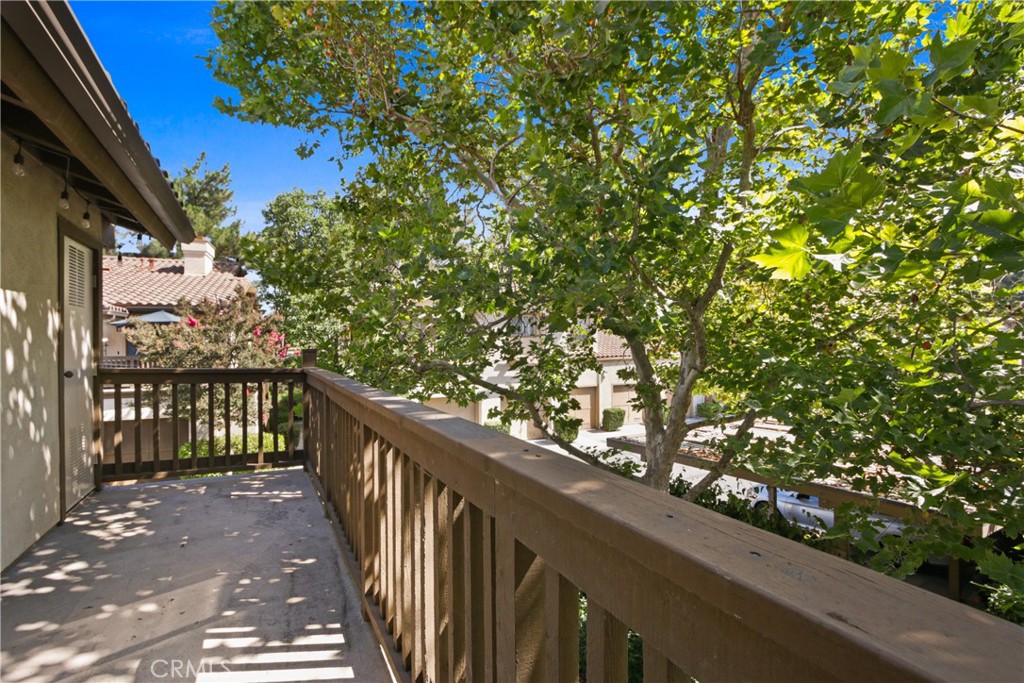 112 Timbre Rancho Santa Margarita, CA 92688 - Photo 9 of 11 a balcony with trees in the background