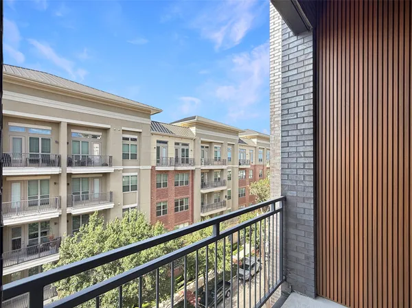a view of a building from a balcony