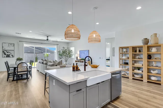 a kitchen with counter top space and breakfast area