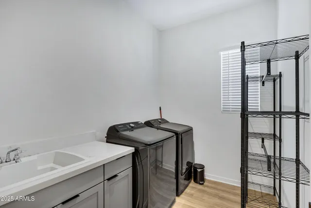 a bathroom with a sink and mirror