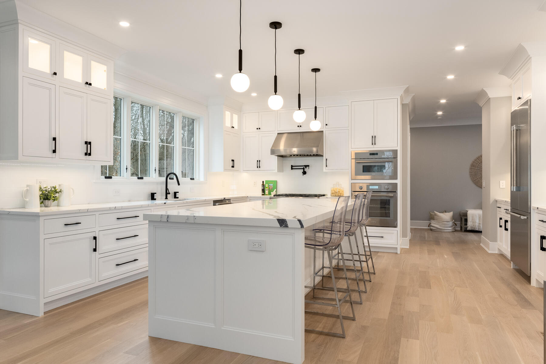 82 Eden Road Stamford, CT 06907 - Photo 14 of 18 a kitchen with stainless steel appliances kitchen island granite countertop a sink and cabinets