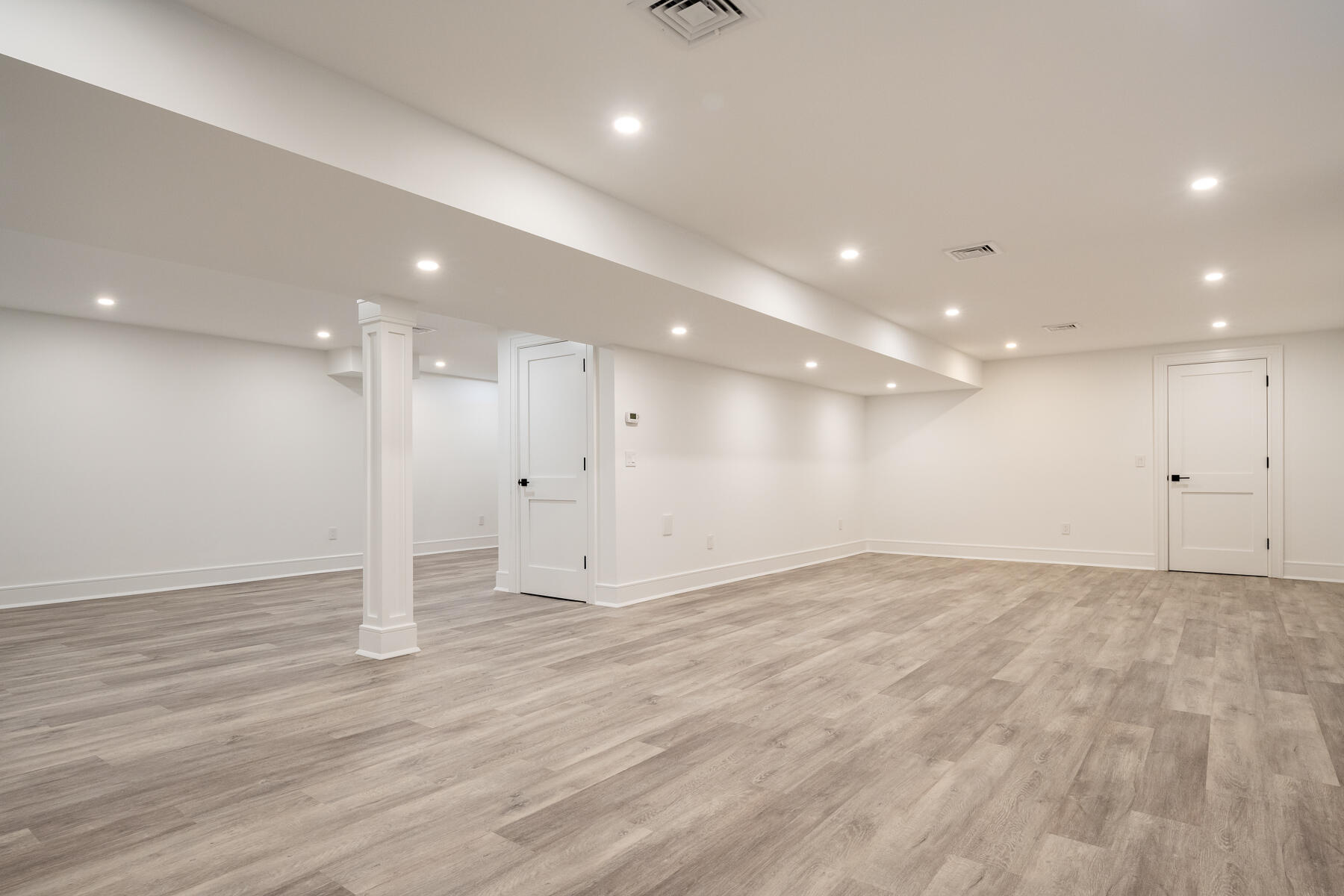 82 Eden Road Stamford, CT 06907 - Photo 18 of 18 a view of an empty room with wooden floor