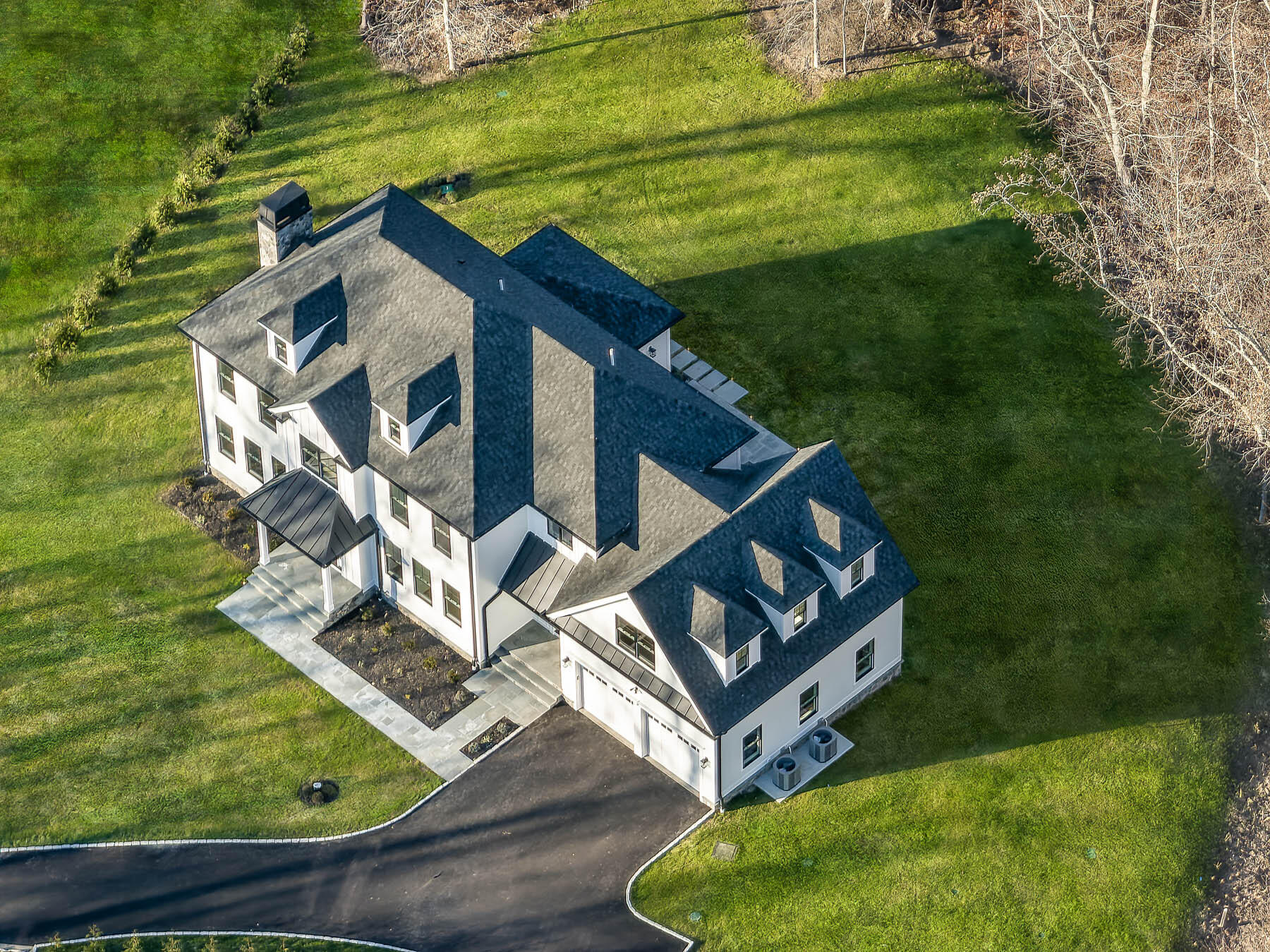 82 Eden Road Stamford, CT 06907 - Photo 4 of 18 a view of a house with a yard