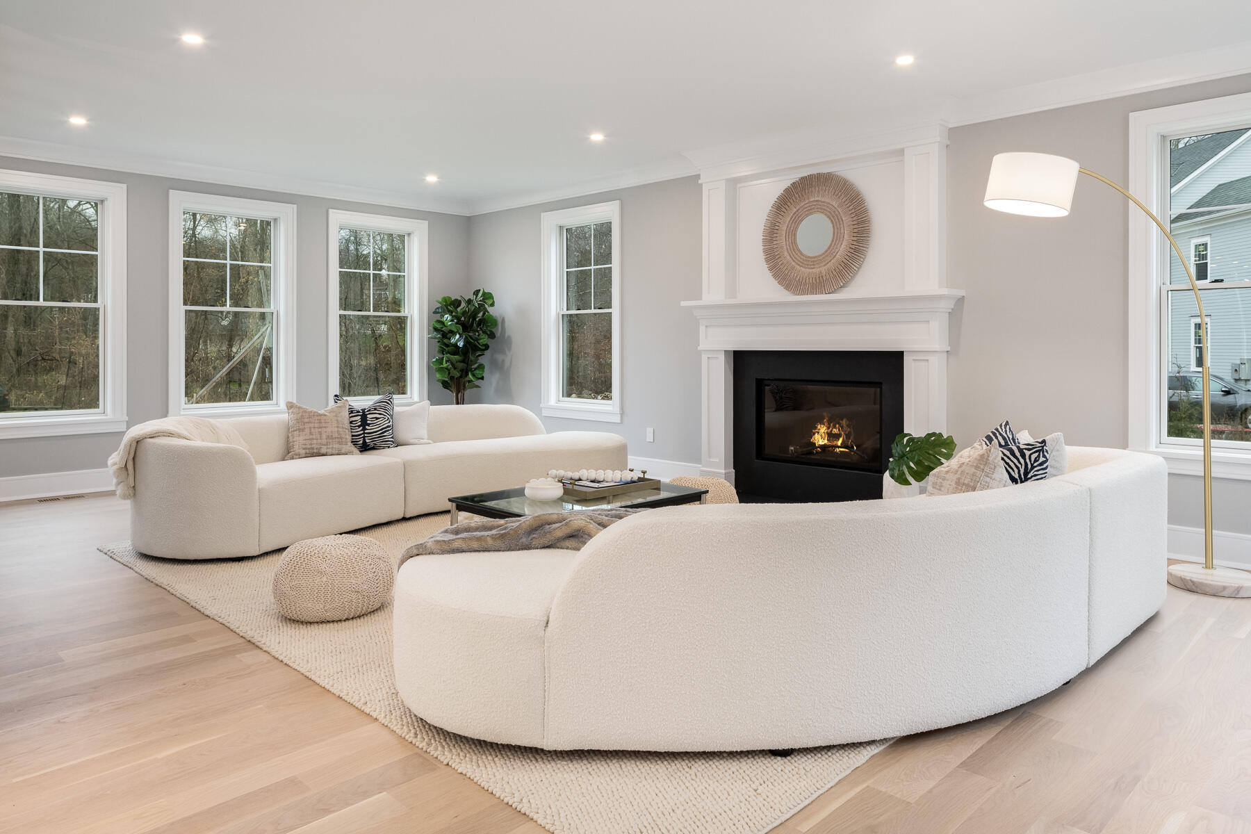 82 Eden Road Stamford, CT 06907 - Photo 8 of 18 a living room with furniture and a fireplace