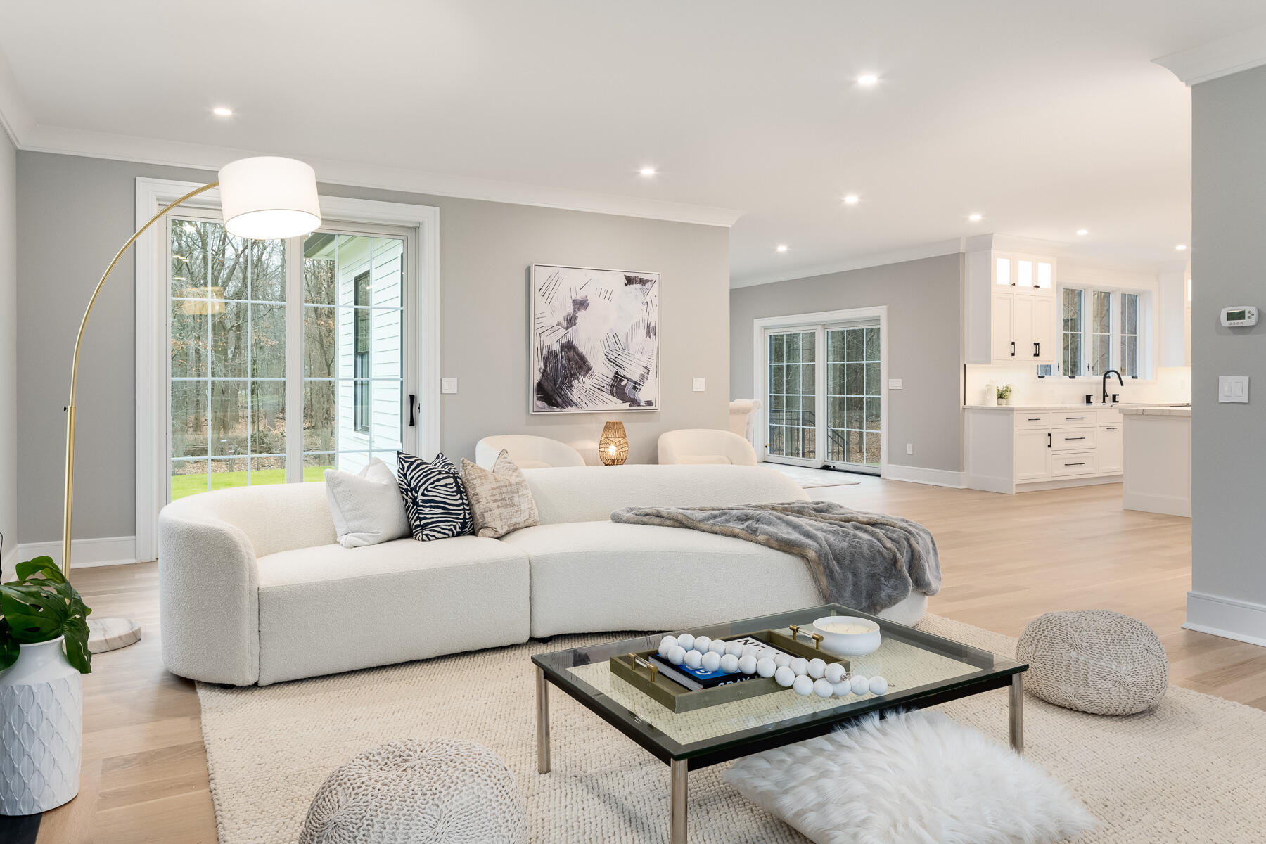 82 Eden Road Stamford, CT 06907 - Photo 9 of 18 a living room with furniture and a chandelier