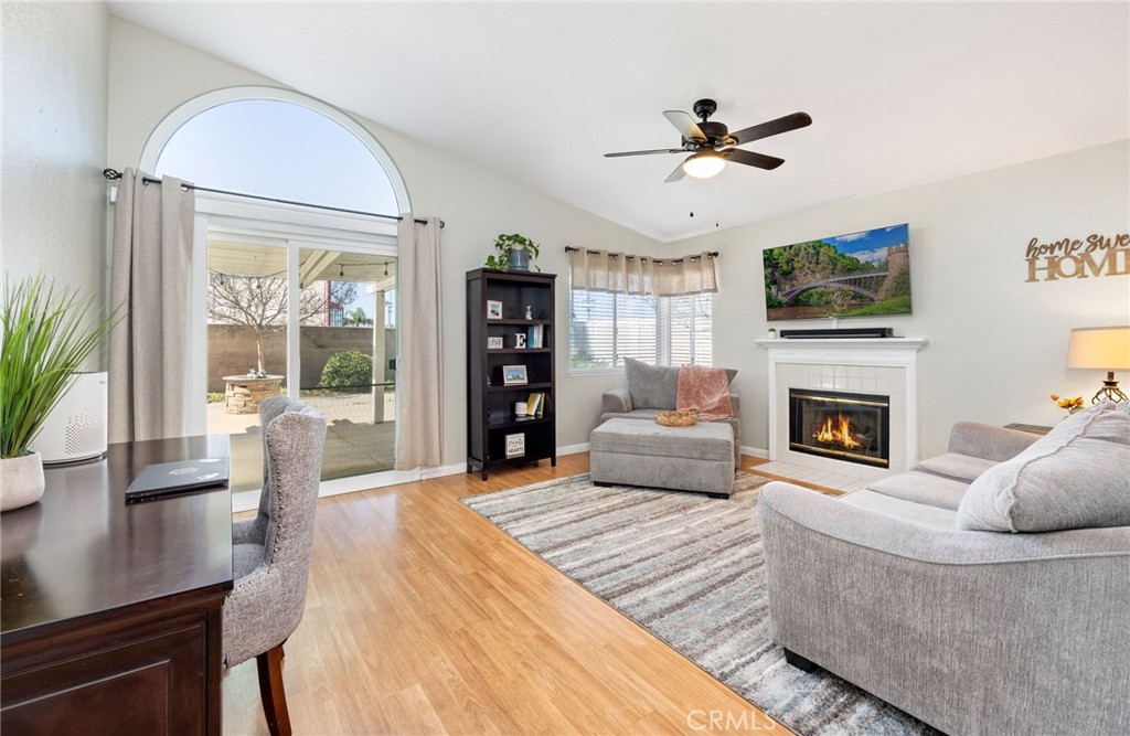 3147 Wimbledon Way Hemet, CA 92545 - Photo 15 of 41 a living room with furniture fireplace and window