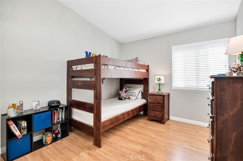 3147 Wimbledon Way Hemet, CA 92545 - Photo 26 of 41 a bedroom with a bunk bed and a desk