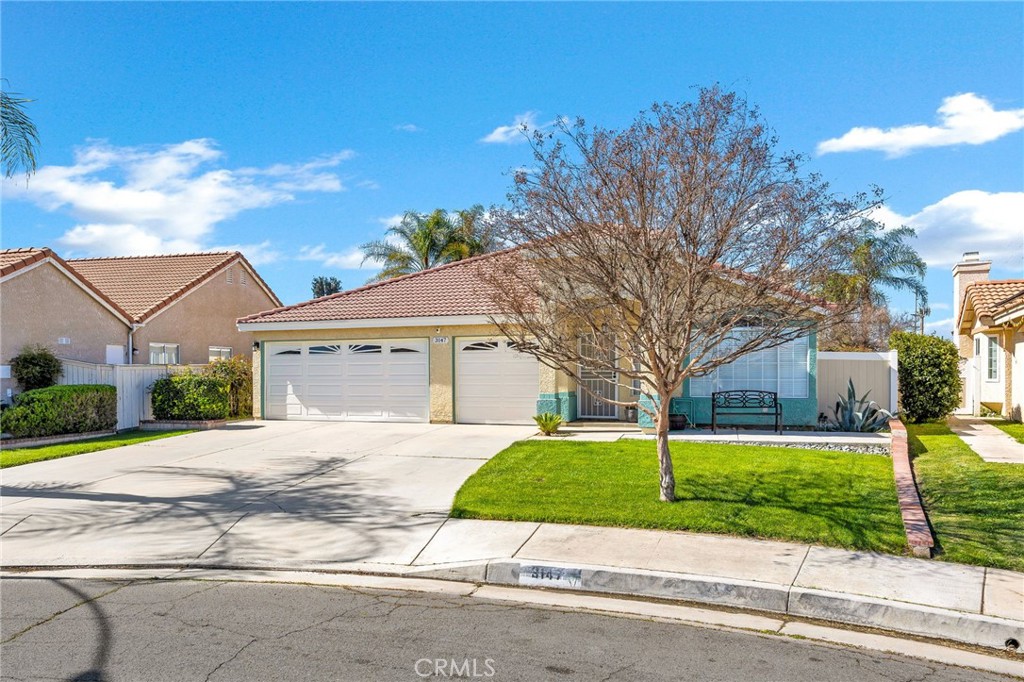 3147 Wimbledon Way Hemet, CA 92545 - Photo 3 of 41 front view of a house with a yard