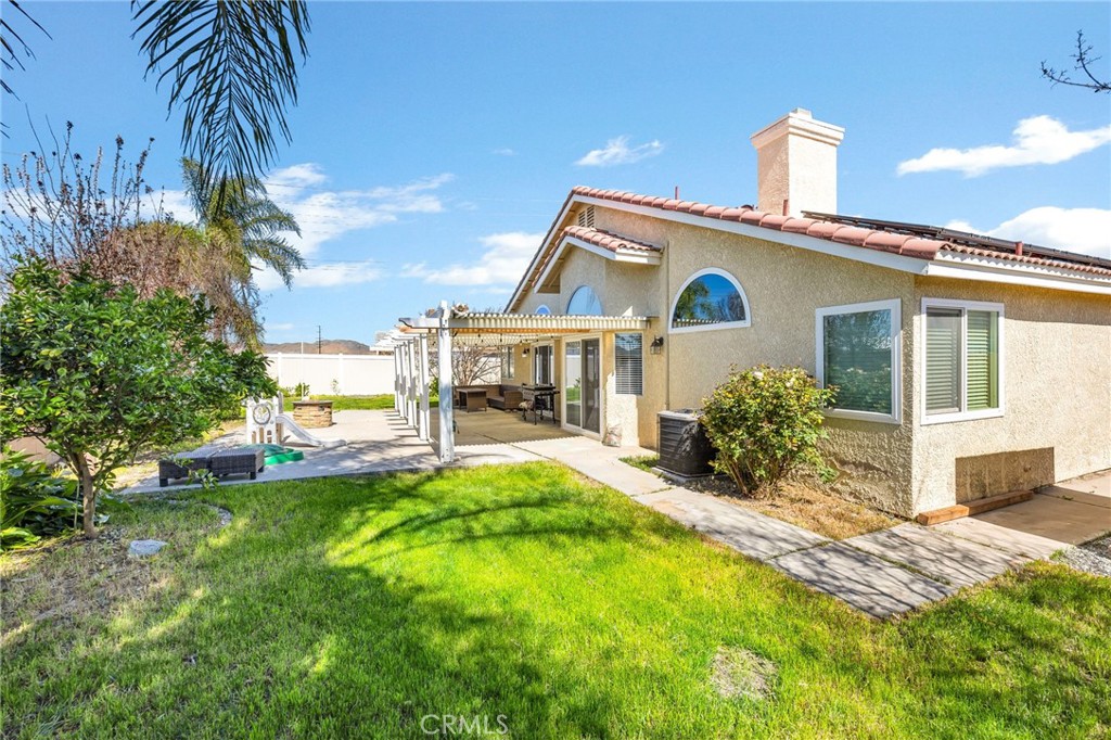 3147 Wimbledon Way Hemet, CA 92545 - Photo 38 of 41 a view of house with swimming pool outdoor seating